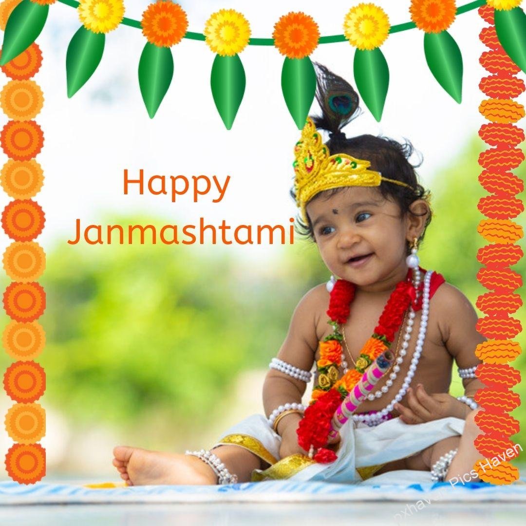 Beautiful Baal Gopal baby Krishna in White color dress with flowers and flute and peacock feather ready for Janmashtami. Happy Janmashtami.
