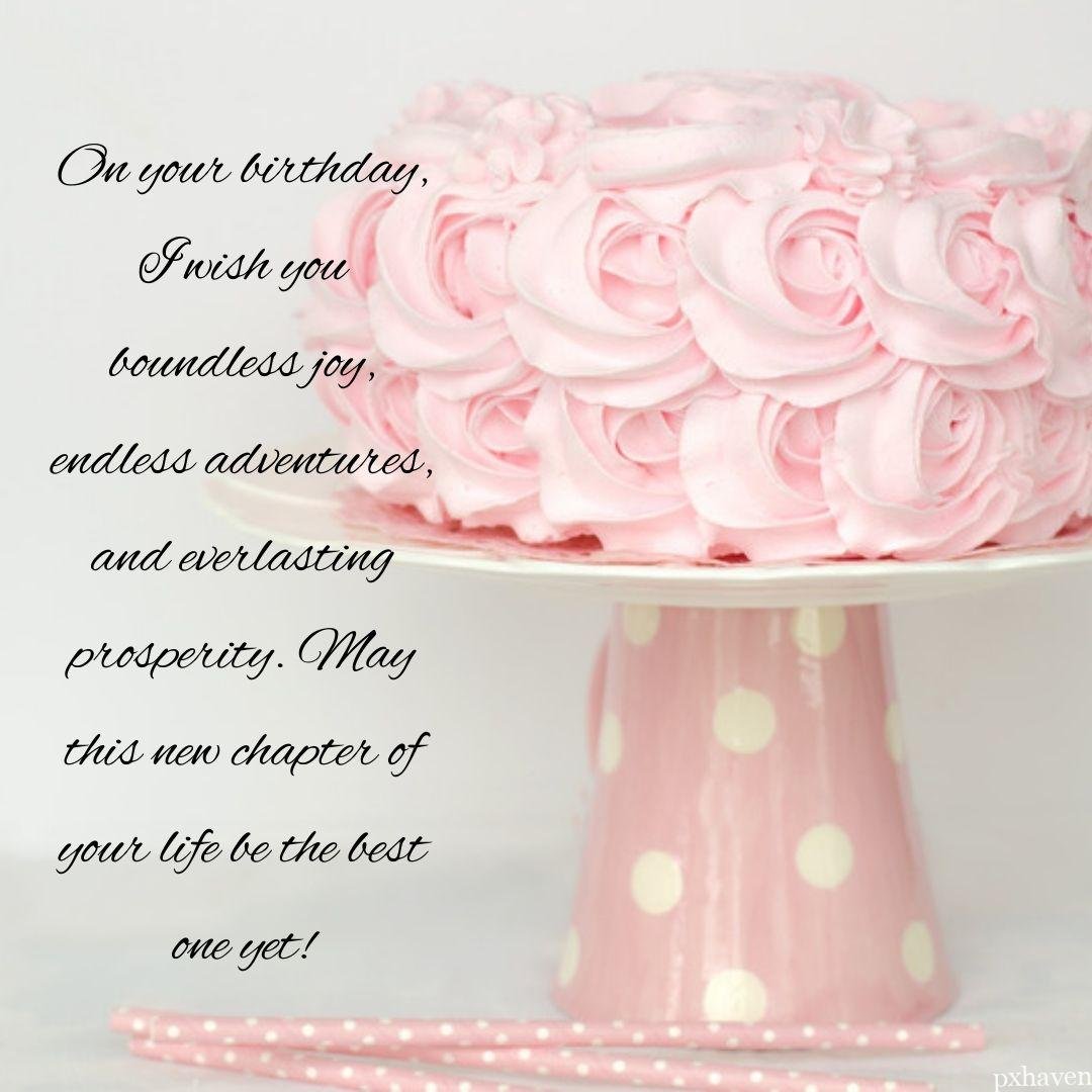 A lovely pink cake on a cake stand wishing you happy birthday On your birthday, I wish you boundless joy, endless adventures, and everlasting prosperity. May this new chapter of your life be the best one yet!