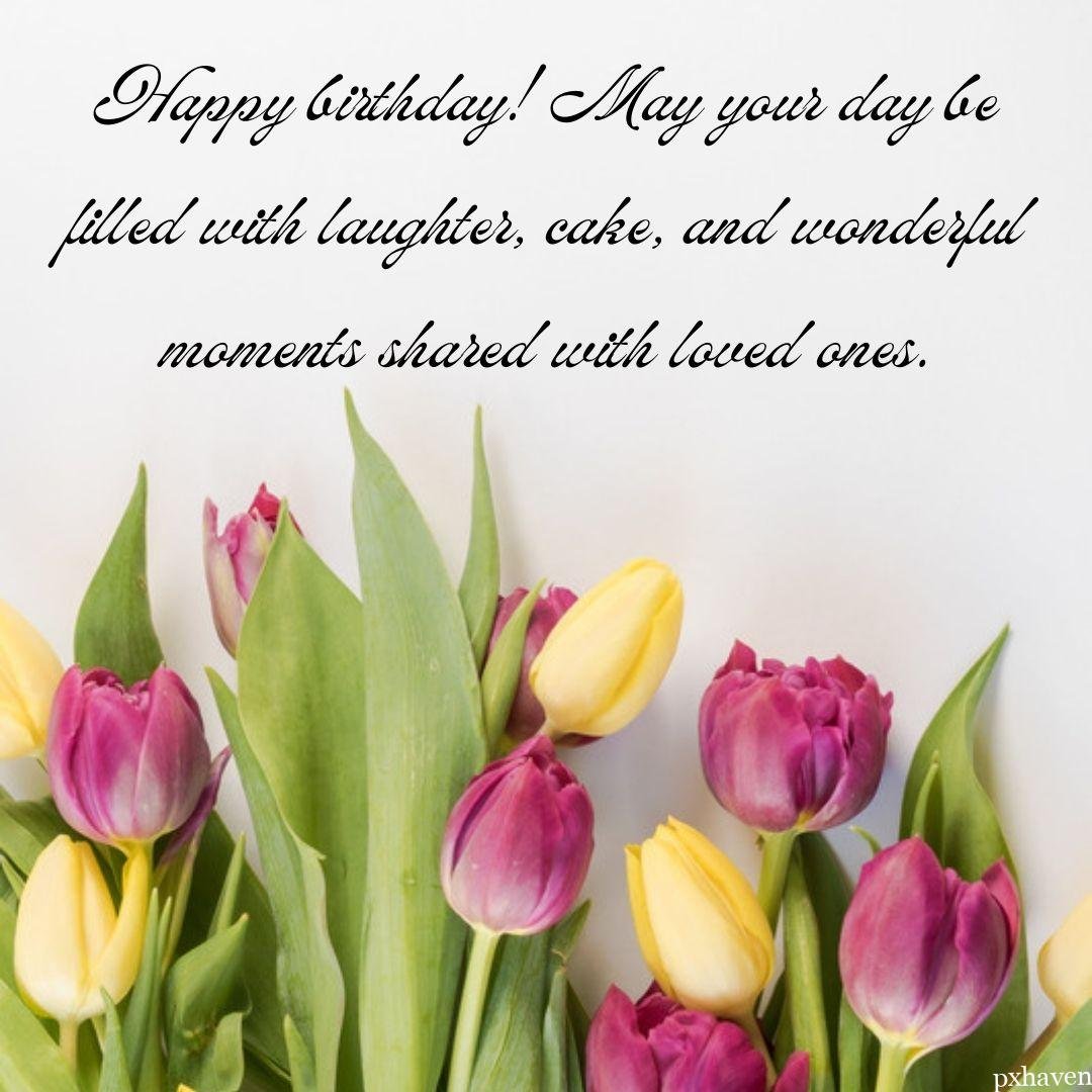 Yellow and pink beautiful tulips with green leaves wishing you Happy birthday. May your day be filled with laughter, cake and wonderful moments shared with loved ones.
