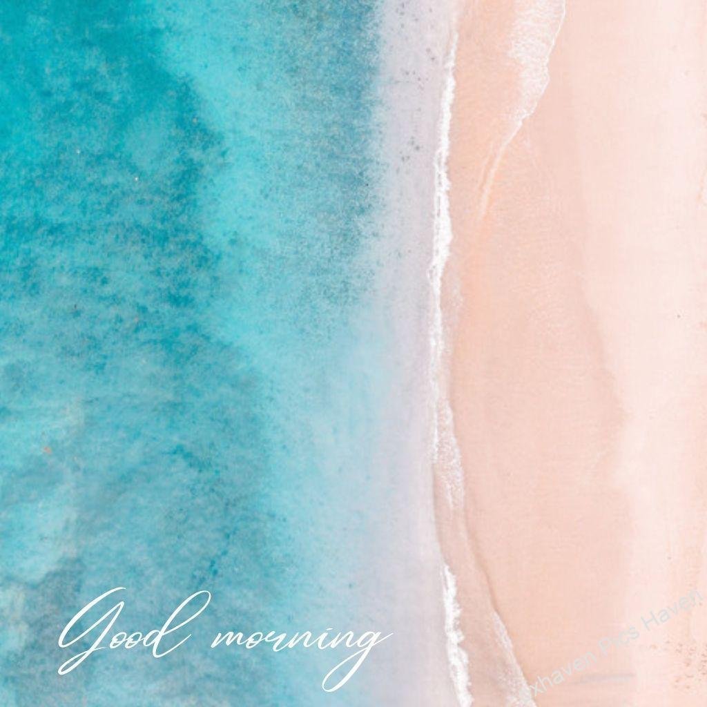 Beautiful Good Morning Images and quotes.HD image free download. Blue colour sea with sand wishing good morning. HD image/photo free download