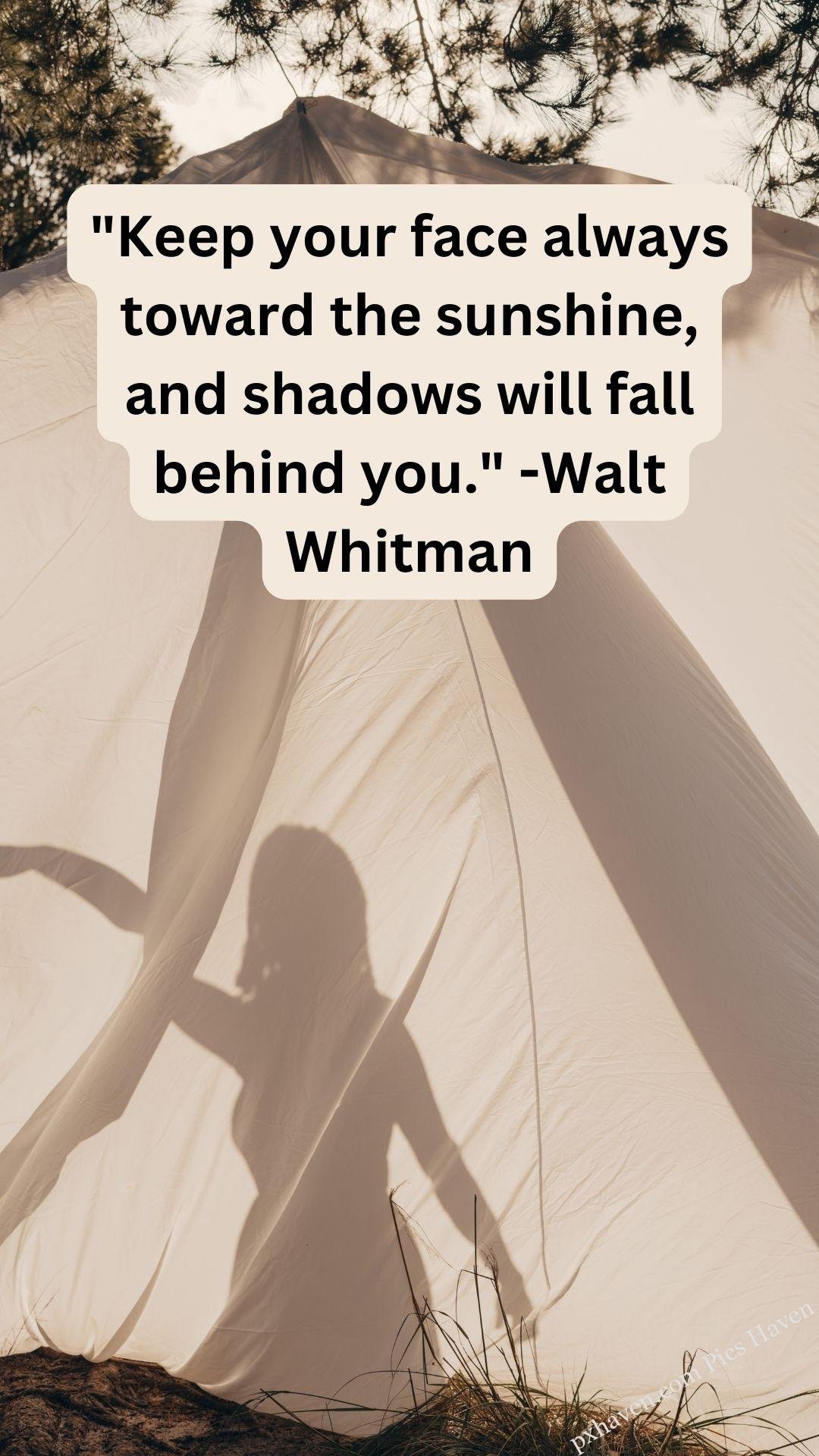 A woman behind a tent with light. "Keep your face always toward the sunshine, and shadows will fall behind you." -Walt Whitman. Whatsapp status. Motivation quotes. HD image. Free download.