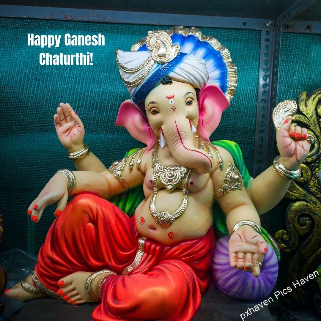 Lovely Idol of lord Ganesha Ganpati. Giving blessings. Happy Ganesh Chaturthi. HD Image. Free download.