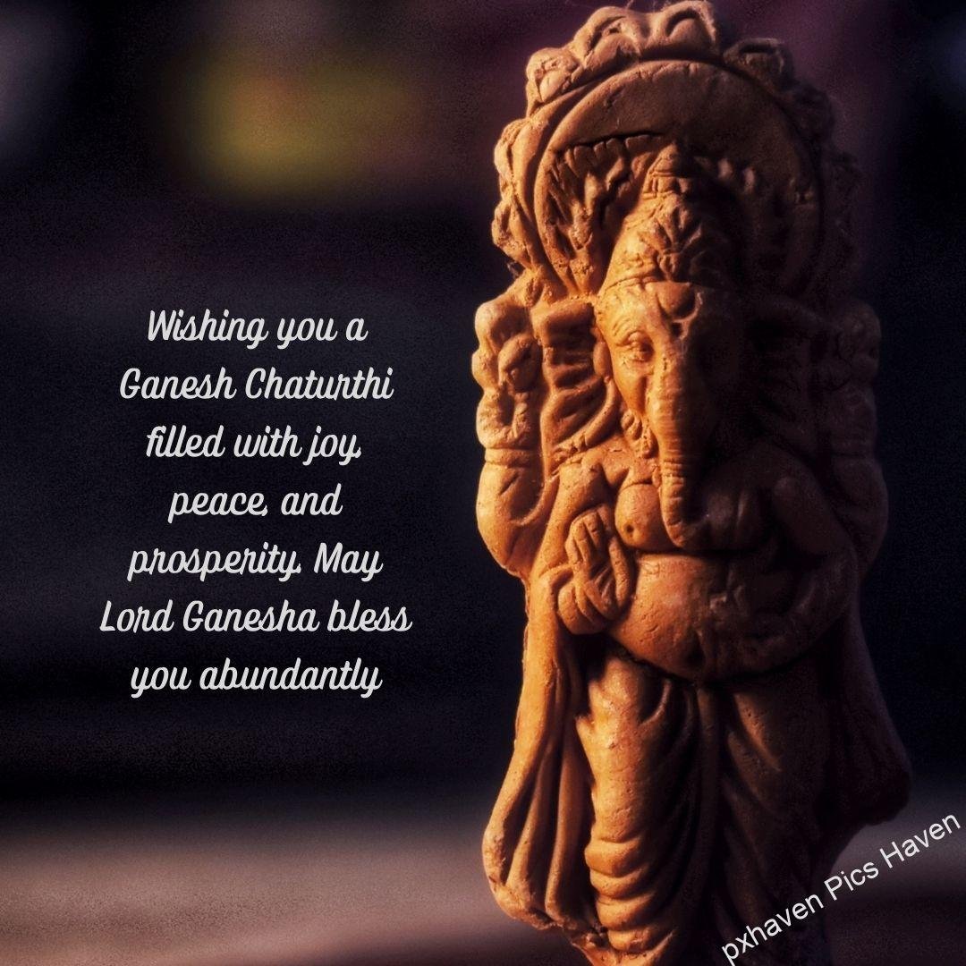 Stone carved Ganesha giving blessings. Wishing you a Ganesh Chaturthi filled with joy, peace, and prosperity. May Lord Ganesha bless you abundantly. free download. HD image wallpaper. Happy Ganesh Chaturthi wishes.