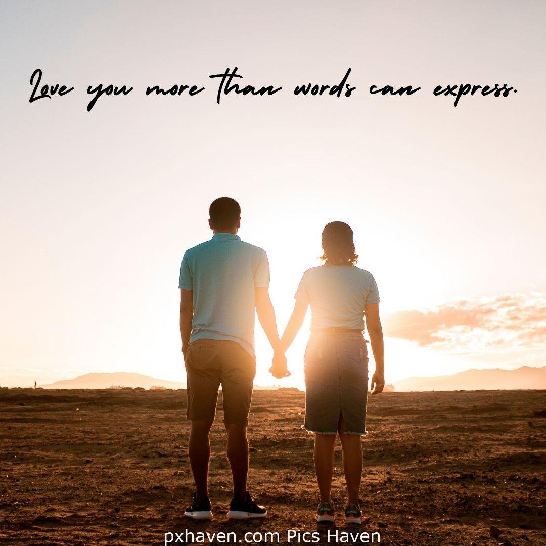Love you more than words can express. A man and woman, playing and standing hand in hand on the mountain. Love Quotes and Images for Couples. HD images. Free download.