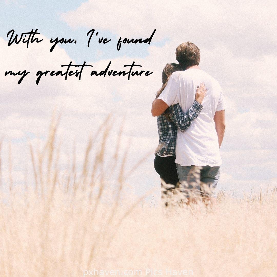With you, I've found my greatest adventure. A girl and boy on adventure hugging each other in relationship and love. romantic couple images and quotes. Love Quotes and Images for Couples. HD images. Free download.