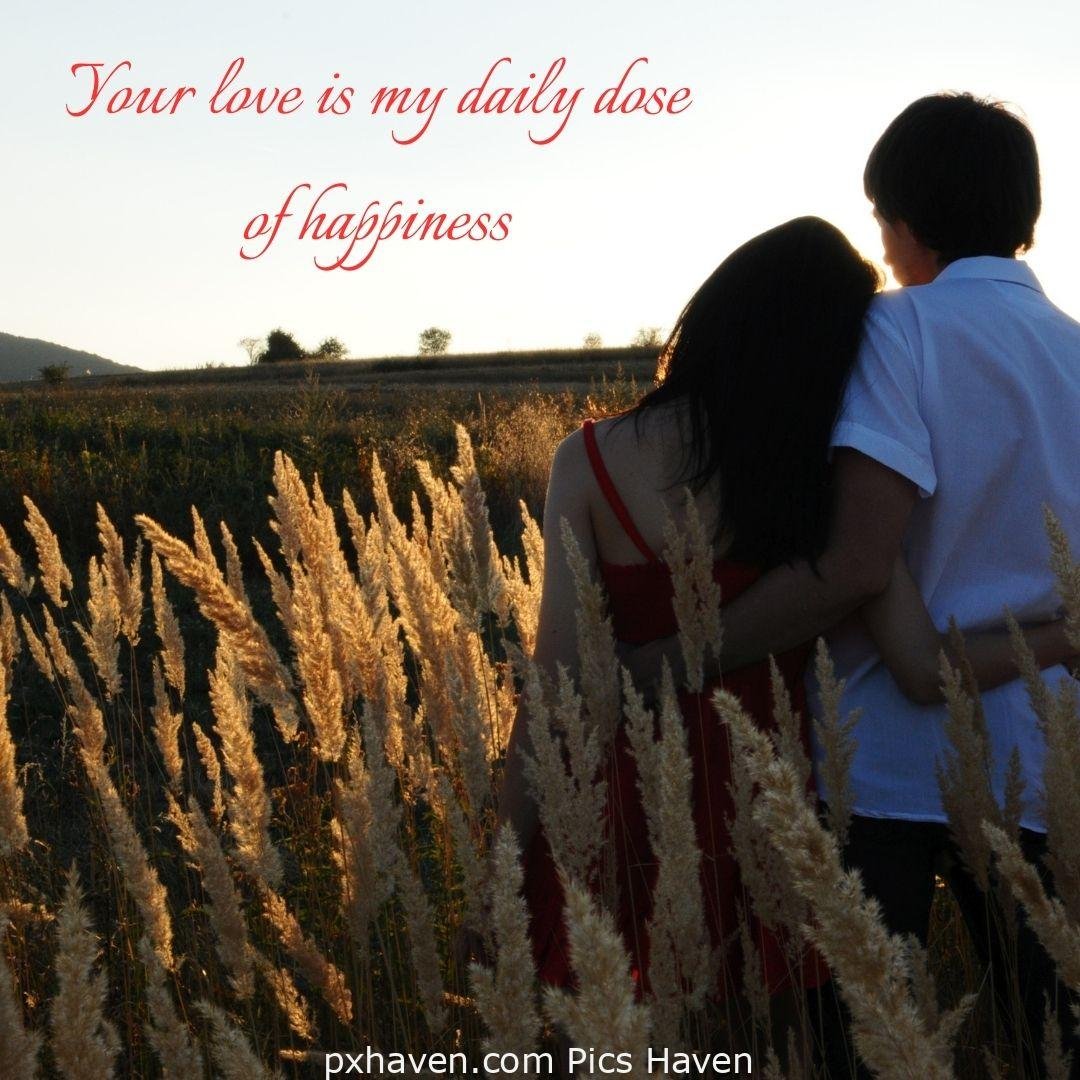 Your love is my daily dose of happiness. A boy and girl hugging and kissing, smiling hand in hand. Love Quotes and Images for Couples. HD images. Free download.