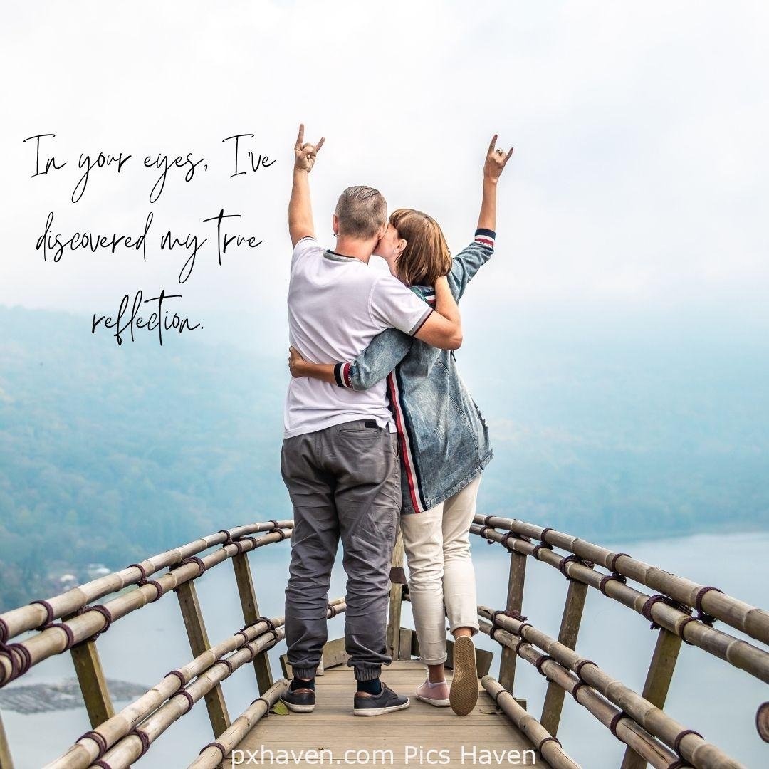 In your eyes, I've discovered my true reflection. A boy and girl hugging and kissing, smiling hand in hand. Love Quotes and Images for Couples. HD images. Free download.