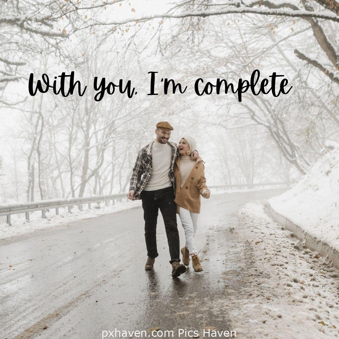 With you. I'm complete. A girl and boy hugging each other outside. Snow fall. Love Quotes and Images for Couples. HD images. Free download.