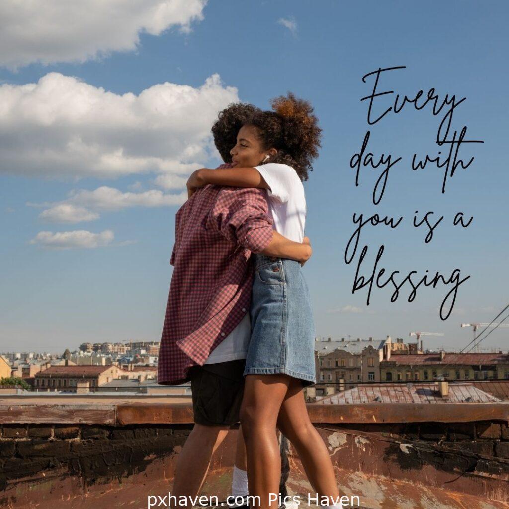 Everyday with you is a blessing. A girl and boy hugging and playing together on the terrace. Love Quotes and Images for Couples. HD images. Free download.