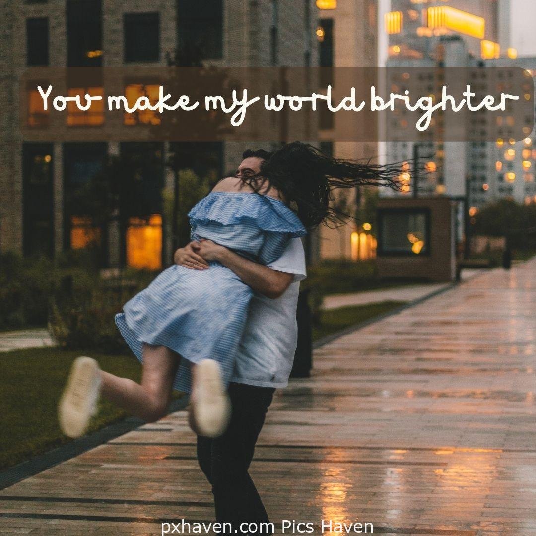 You make my world brighter. A girl and boy playing together on the market place. Love Quotes and Images for Couples. HD images. Free download.