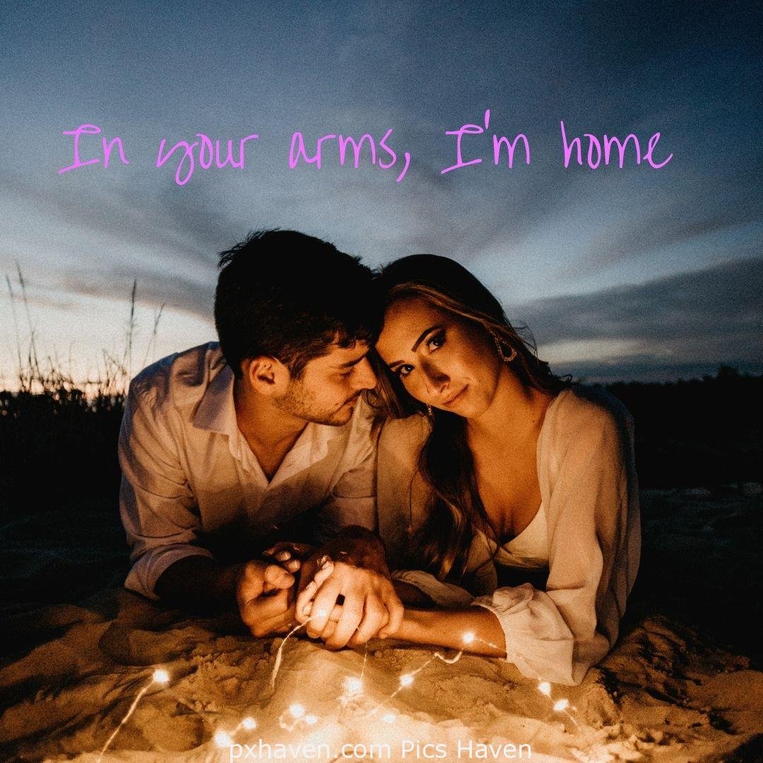 In your arms, I'm home! A girl and boy together on the top of building. Love Quotes and Images for Couples. HD images. Free download.