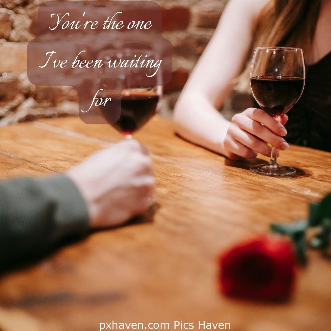 You're the one I've been waiting for. A girl and boy together and talking with wine glass. Love Quotes and Images for Couples. HD images. Free download.