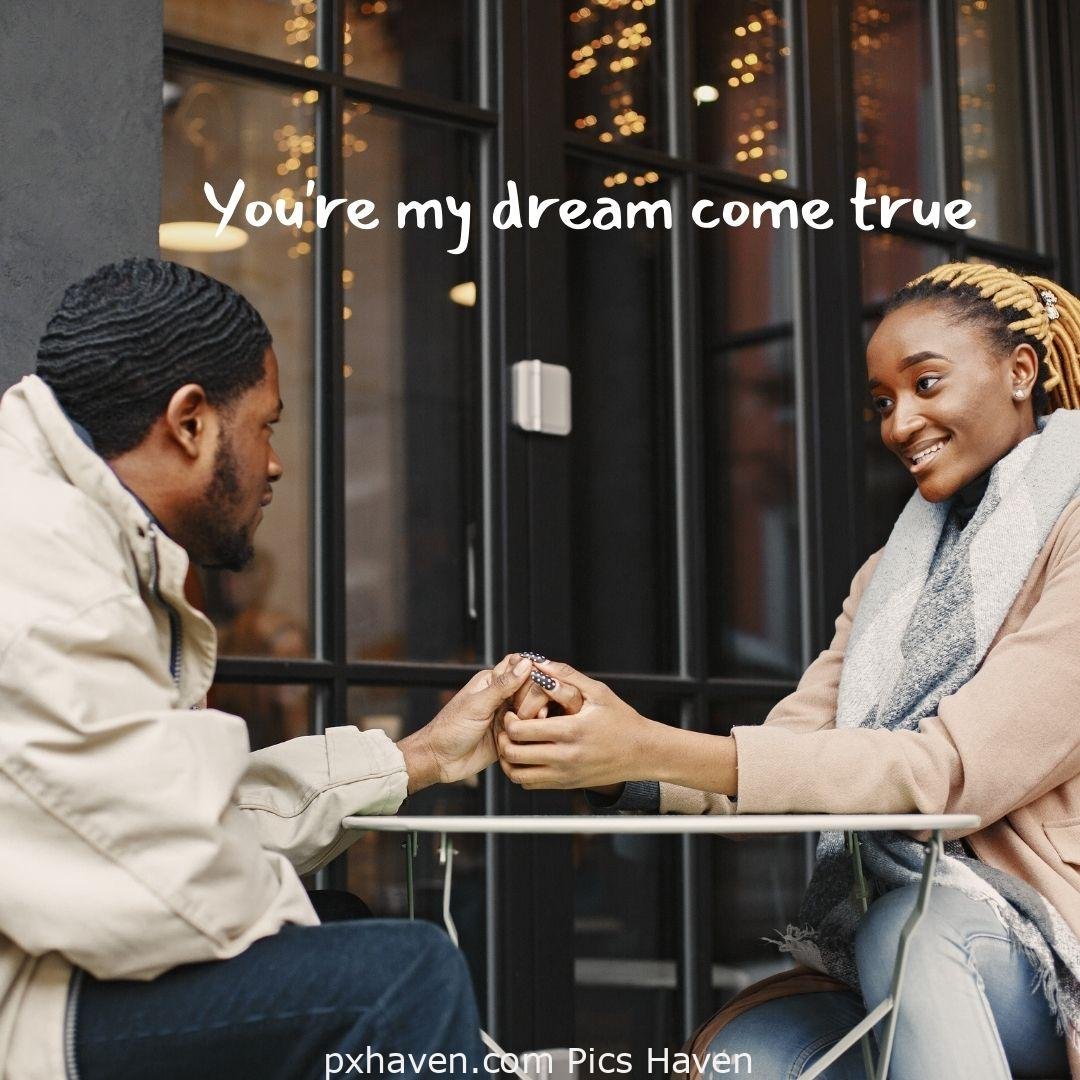 You're my dream come true. A boy and girl sitting and talking. relationship and love. romantic couple images and quotes. Love Quotes and Images for Couples. HD images. Free download.