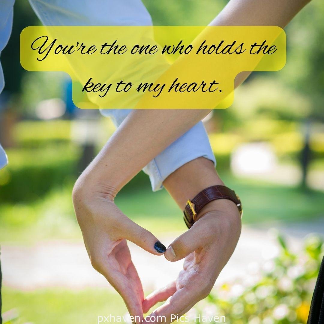You're the one who holds the key to my heart. A boy and girl, sitting and holding hands. Love Quotes and Images for Couples. HD images. Free download.