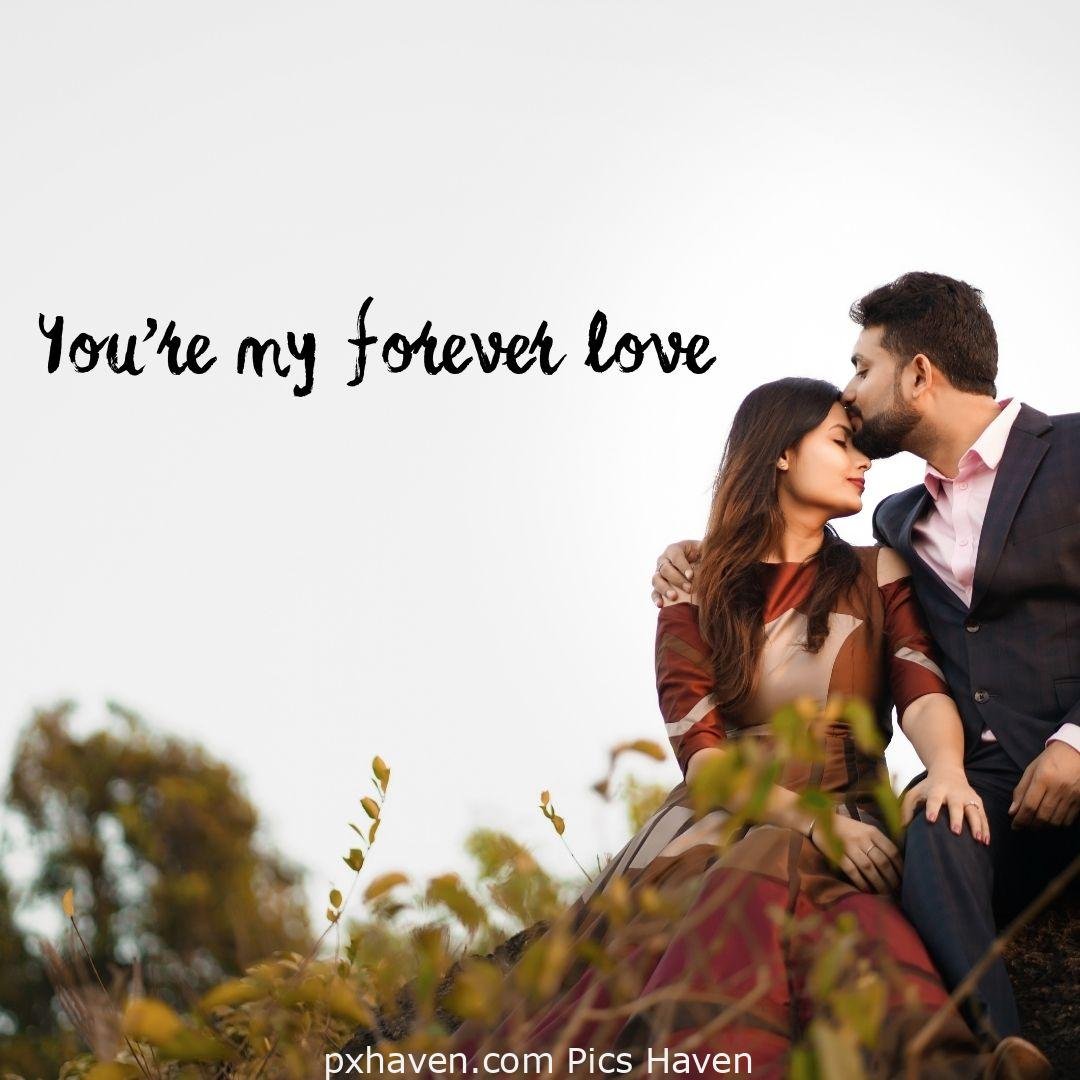 You're my forever love. A boy and girl sitting and talking kissing on forehead. relationship and love. romantic couple images and quotes. Love Quotes and Images for Couples. HD images. Free download.