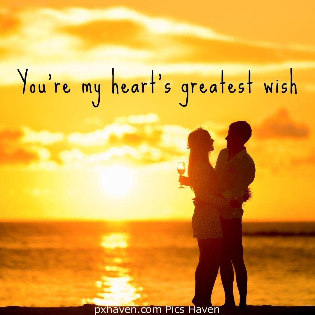 You're my heart's greatest wish. A boy and girl hugging each other in the sea shore and dancing. relationship and love. romantic couple images and quotes. Love Quotes and Images for Couples. HD images. Free download.