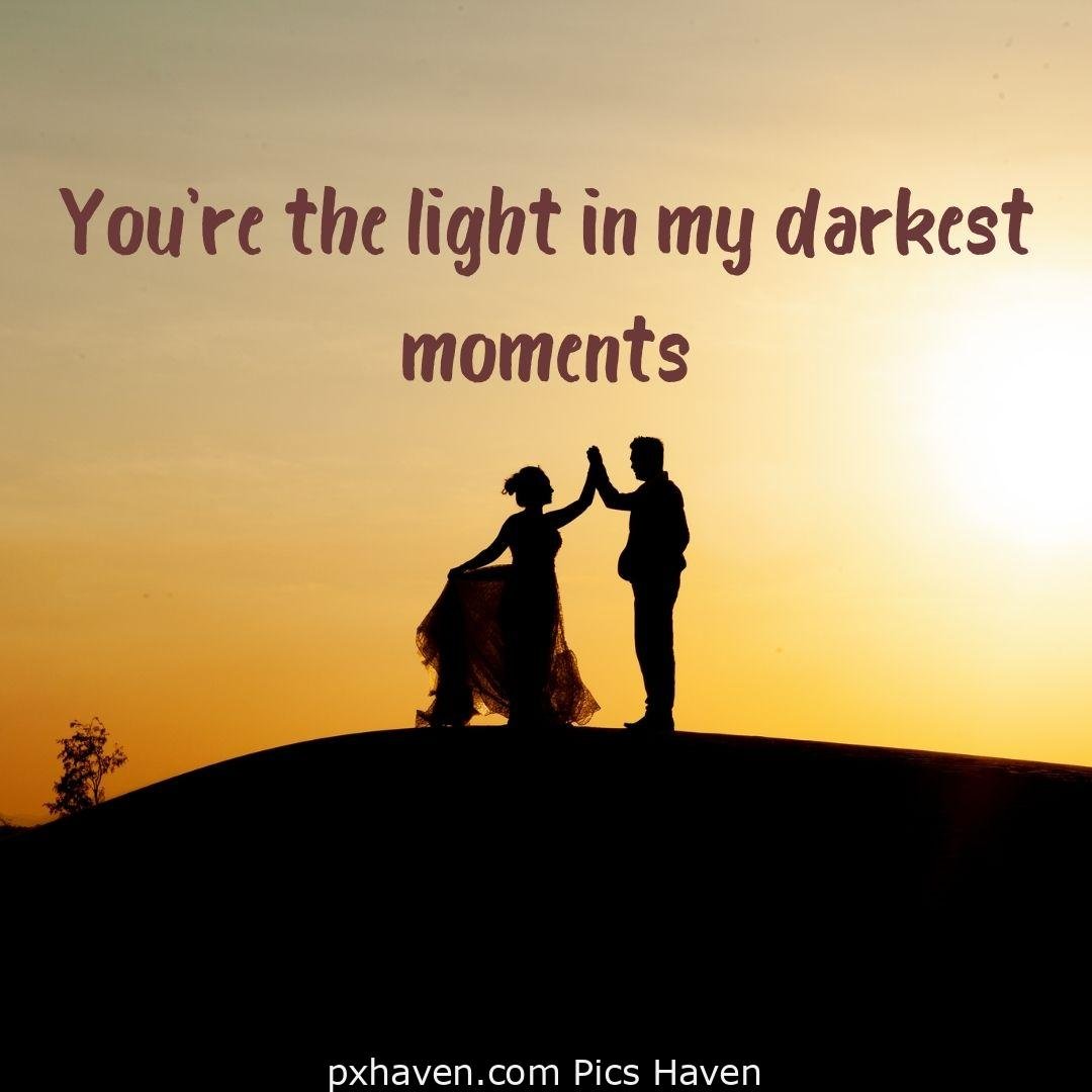 You're the light in my darkest moments. A boy and girl dancing together in wedding dress in relationship and love. romantic couple images and quotes. Love Quotes and Images for Couples. HD images. Free download.