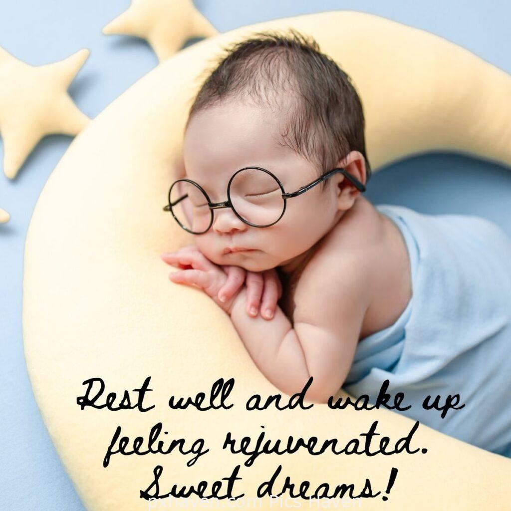 A baby sleeping on a yellow colour moon pillow. Rest well and wake up feeling rejuvenated. Sweet dreams! HD images. Free download. Good Night WhatsApp images.